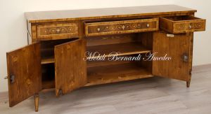 Handcrafted sideboard made of solid wood and richly inlaid in walnut and olive wood in neo-classical style